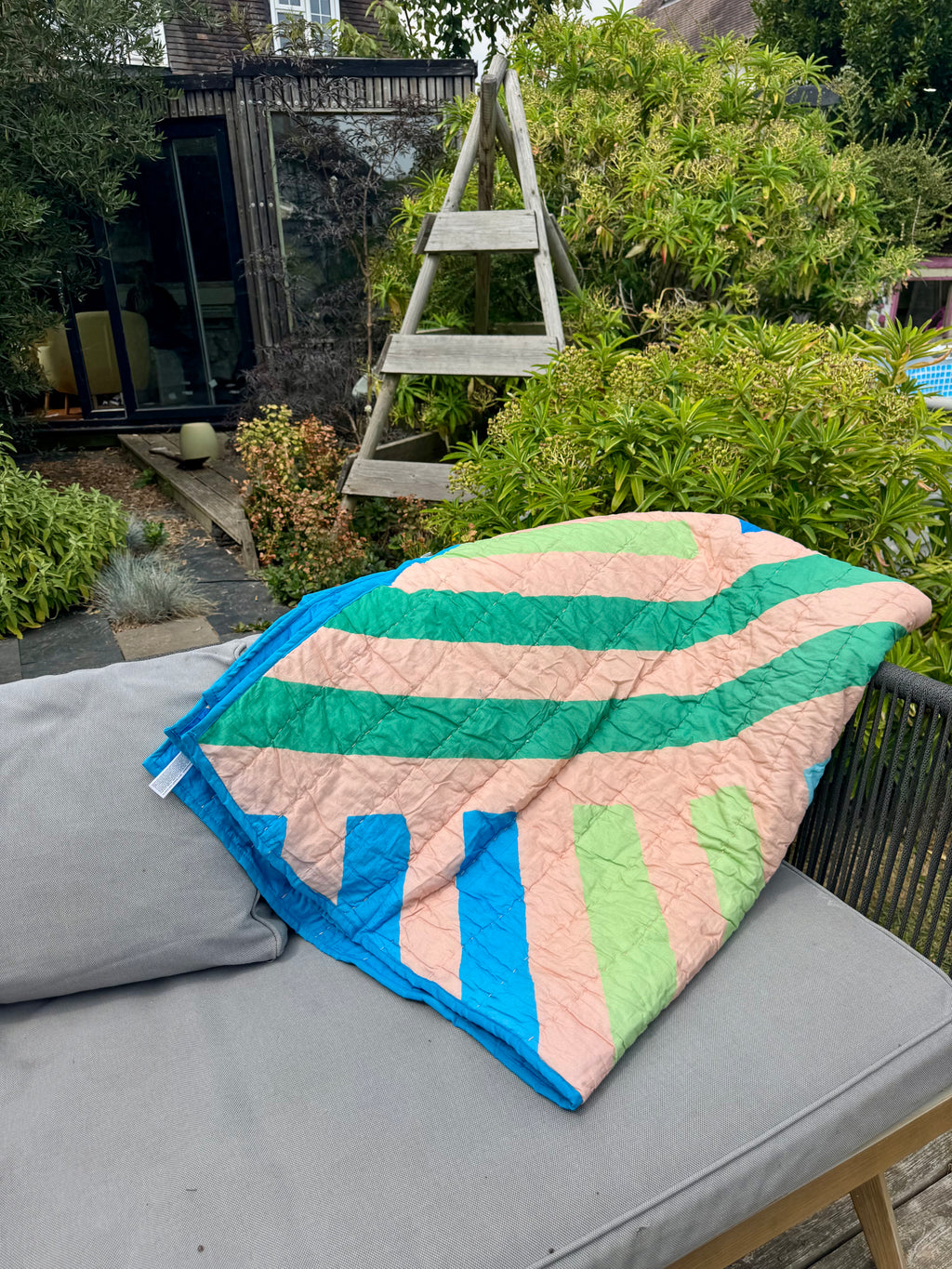 Geometric stripe quilted throw / blanket