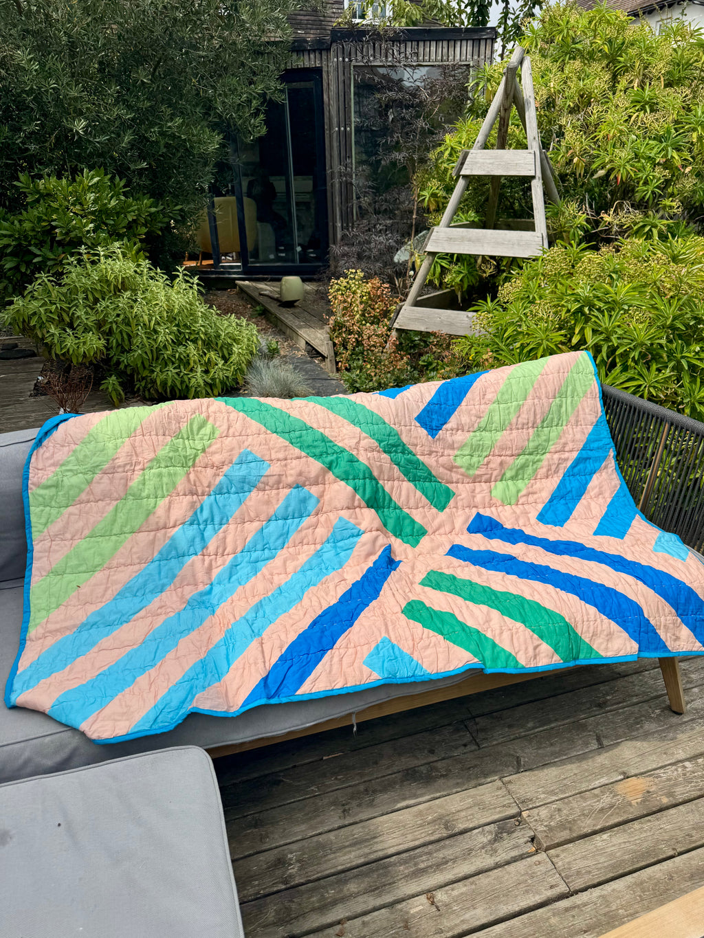 Geometric stripe quilted throw / blanket